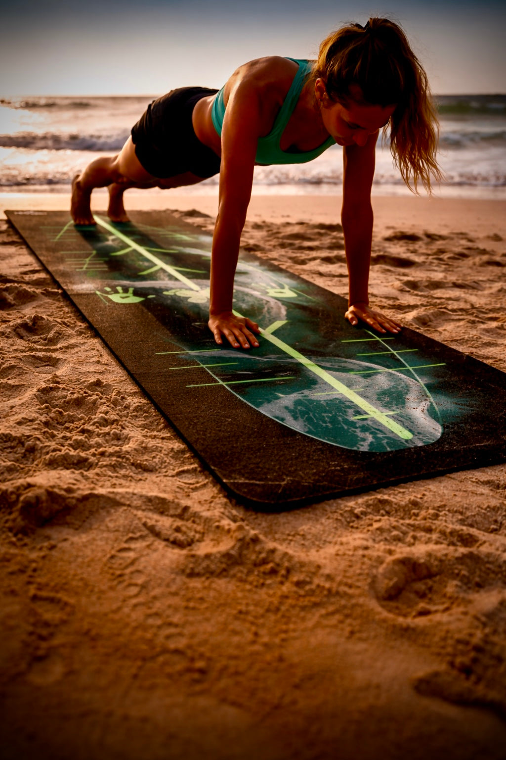 Yeowga yoga mat in use on a beach